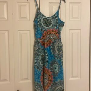 Yathon colorful dress that has pockets. Size XL with spaghetti straps.